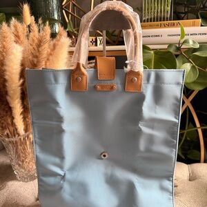 MaggiB Light Blue Folding Tote Bag with Tan leather Accents -